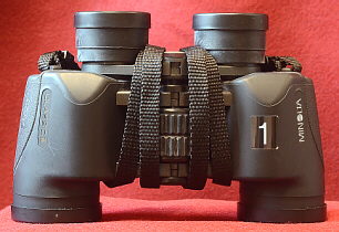 binoculars with strap wrapped